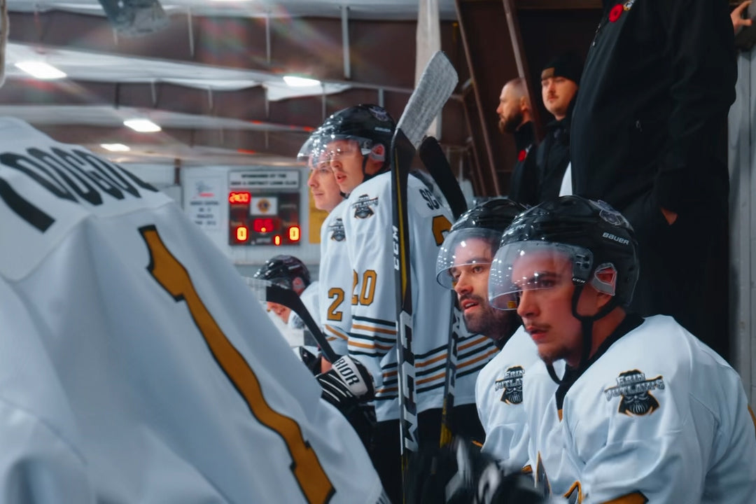 Erin Outlaws on the bench following the action on-ice